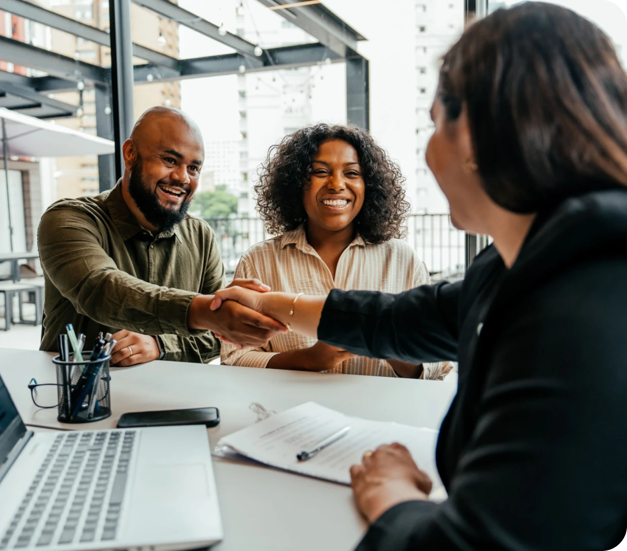 Positive business agreement discussion indoors